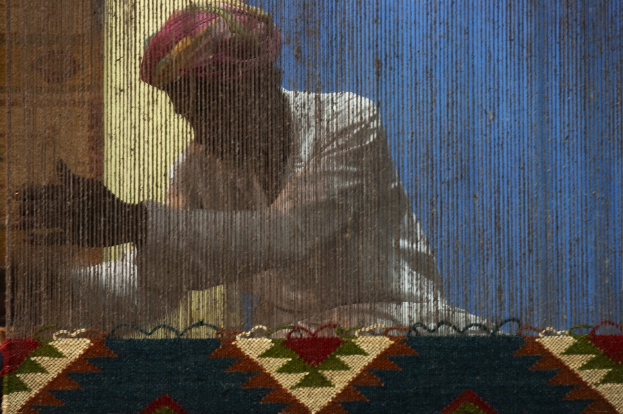 Weaving a dhurrie at the City Palace; Jaipur; Rajasthan. 2005
